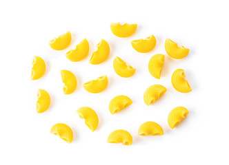 uncooked macaroni on a white background.