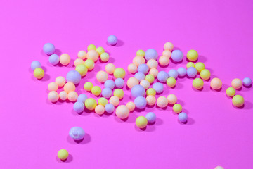 Foam balls on a pastel pink background for design and Valentine's Day