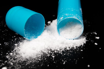 White medical pills and tablets with bottle