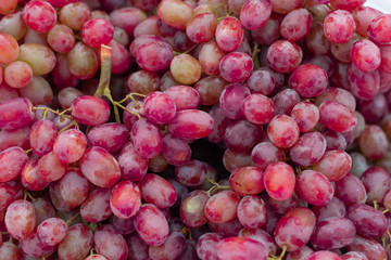 Red grapes background.