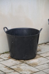 Black flexible plastic basins for gardening