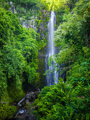 Maui, Hawaii Hana Highway - Wailua Falls, near Lihue, Kauai. Road to Hana connects Kahului to the town of Hana Over 59 bridges, 620 curves, tropical rainforest
