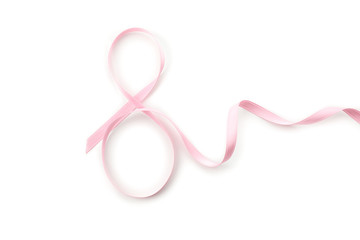 Obraz na płótnie Canvas Eight made of pink ribbon isolated on white background