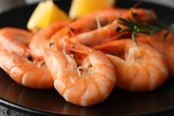 Plate with delicious cooked shrimps, close up