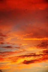 Poster zonsondergang met wolken behang © PeCé
