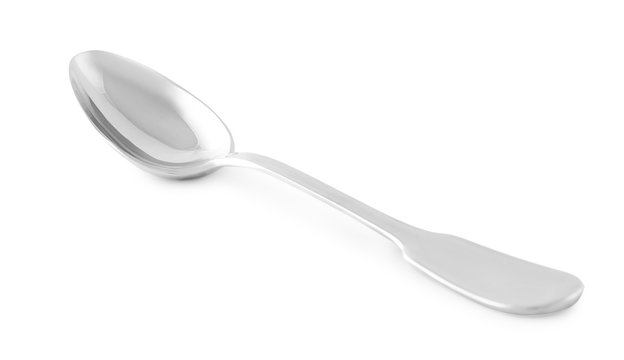 Clean shiny metal spoon isolated on white