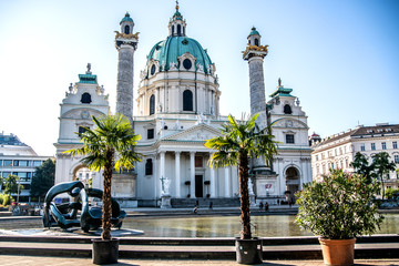 View of the Karlskirche church in the rays of the rising sun.. Vienna. Austria. 