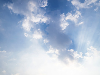 blue sky horizontal with beautiful puffy fluffy clouds with sunlight, abstract nature background