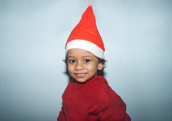 Smiling Little girl in santa hat, Christmas