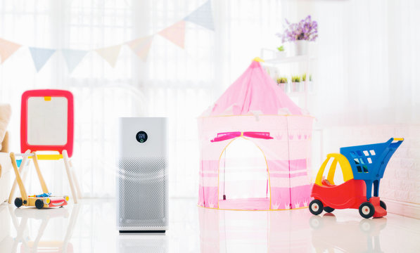 Air Purifier Of Colorful Playing Room For Kids,  Air Cleaner Removing Fine Dust In House. Protect PM 2.5 Dust And Air Pollution Concept