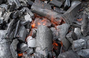 Charcoal briquettes ready for barbecue grill, beautiful fire.