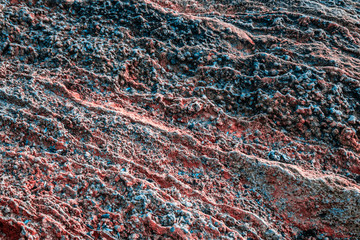 Ribbed blue golden texture on the stone. Abstract background