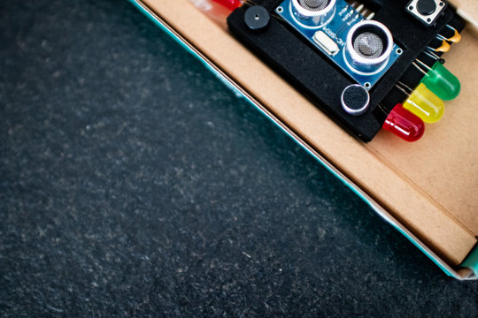 Electronic tools for computer science and science education through experimentation. STEAM education kit for coding and making. Sensors, LEDs and wires in a box for students in engineering school