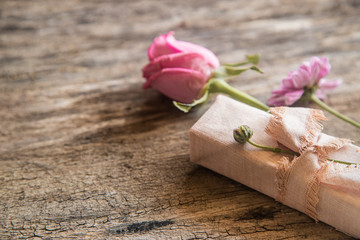 Bouquet of pink roses on a wooden background. zero waste gift on Mother's Day. Women's day card. 8 march happy womens day. copy space