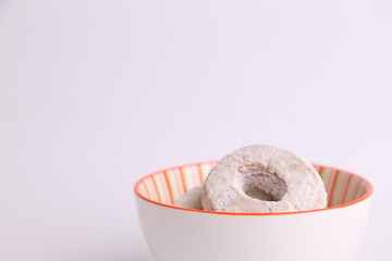 homemade bagel with sugar in bowl