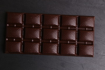 milk chocolate tablet in color background