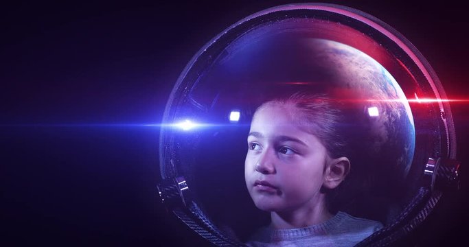 Brave Beautiful Little Girl Astronaut In Space Helmet Looking At Panning Camera. She Is Exploring Outer Space In A Space Suit. Science And Technology Related 4K Concept Footage.