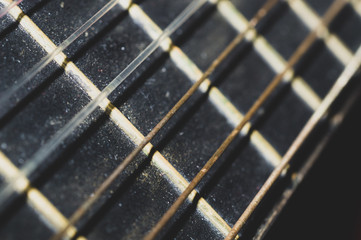 Acoustic guitar neck close up. guitar strings macro