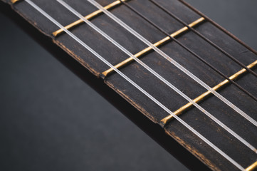 Acoustic guitar neck close up. guitar strings macro