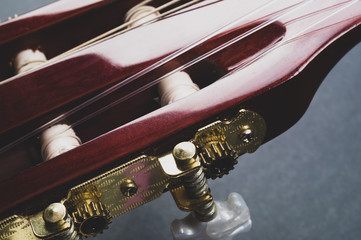 Acoustic guitar headstock close up. musical instrument
