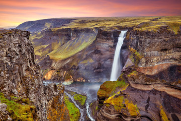 Amazing panoramic view of Haifoss waterfall on the Fossa river near the volcano Hekla, the second highest waterfall in Iceland, 122 meters high, Scandinavia, Europe. Travel concept background..