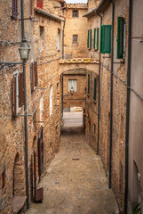 Fototapeta na wymiar Alley in the city of Volterra, Tuscany, Italy