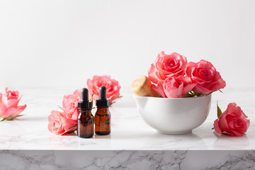 essential oils in bottles rose flowers. alternative medicine aromatherapy - obrazy, fototapety, plakaty