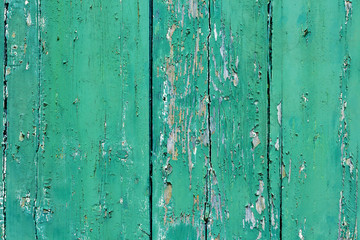 Picturesque background of old stripped blue painted boards