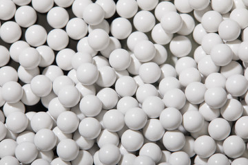 Top view of pattern with white decorative round beads