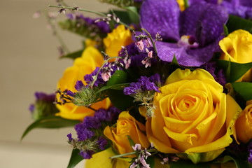 Bright fresh purple and yellow flowers. Decorative composition of a greeting card for a birthday holiday. Copy space.