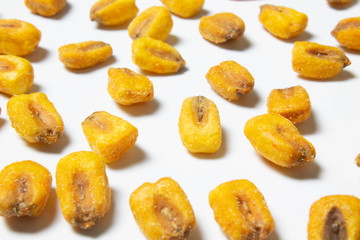 Roasted corn nuts on white background