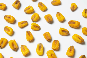 Roasted corn nuts on white background
