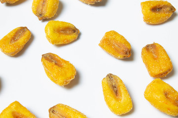 Roasted corn nuts on white background