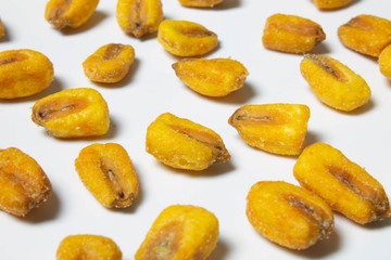 Roasted corn nuts on white background