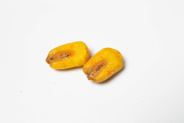 Obraz na płótnie Canvas Roasted corn nuts on white background