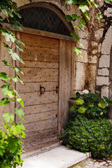 Fototapeta na wymiar Old, typical wooden shutters in Nice, France