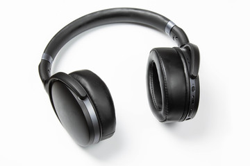 Fototapeta na wymiar Wireless headphones close-up on a white background