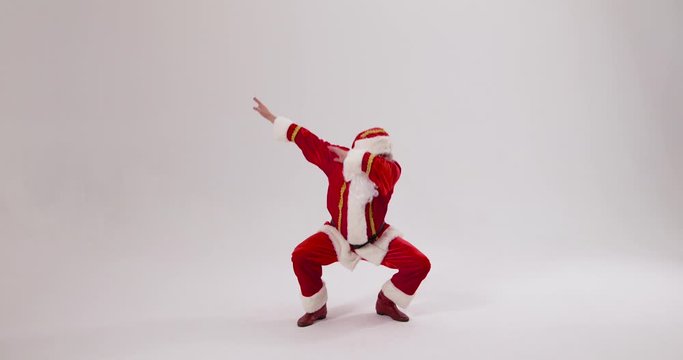 Crazy Santa dabbing on a white background - Slow Motion, Wide Shot