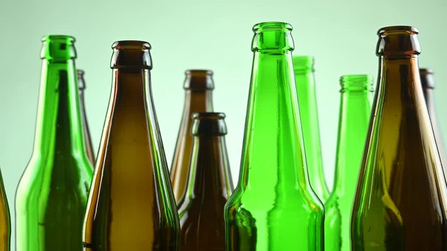 empty beer bottles stand on a white background