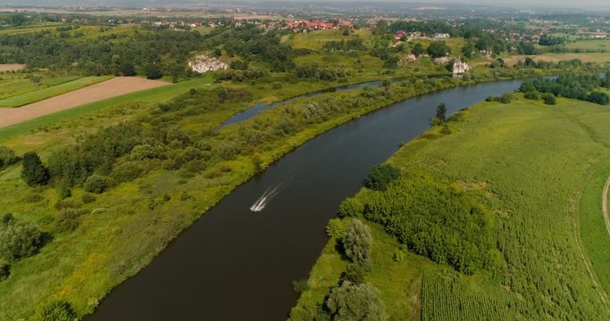 Aerial View of Motorboat swimming in river