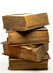 Fototapeta premium Antique old books isolated on white background. Selective focus