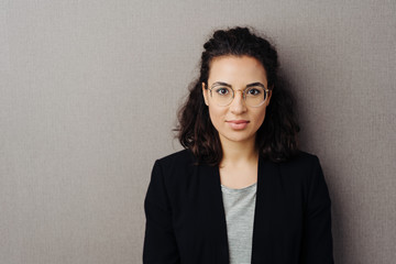 Attractive professional woman looking at camera