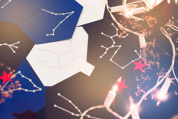 Blue, white, black card with constellation of zodiac sign. Hand painted silver constellations arranged in chaotic order. Horoscope. Fortune telling. Lens flare effect. Astrology and prediction concept