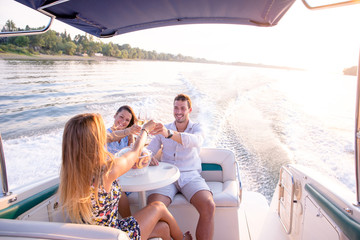 Friends having fun on the boat