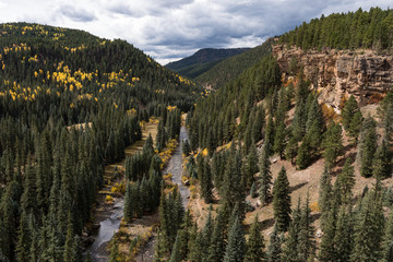 The Historical North Piedra Stock Driveway Trail is next to the Piedra River.  Early autumn colors and dramatic vistas await the visitors too Colorado.