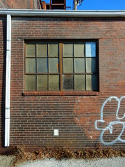 window on urban industrial  wall
