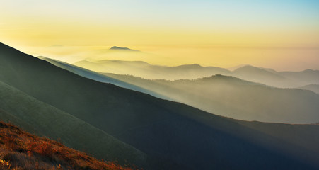 fog in the mountains. scenic sunrise in the Carpathian mountains