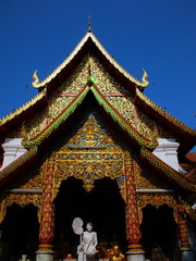 Beautifully decorated facade of Wat Phrathat Doi Southep in Chiangmai Thailand with many Buddha Statues