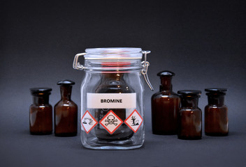 Bromine bottle stock images. Toxic liquid stock images. Brown lab bottle. Brown glass container....
