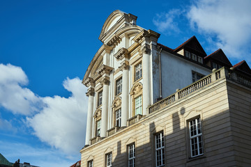 Classicist facade of a historic tenement house with semi-columns in Poznan